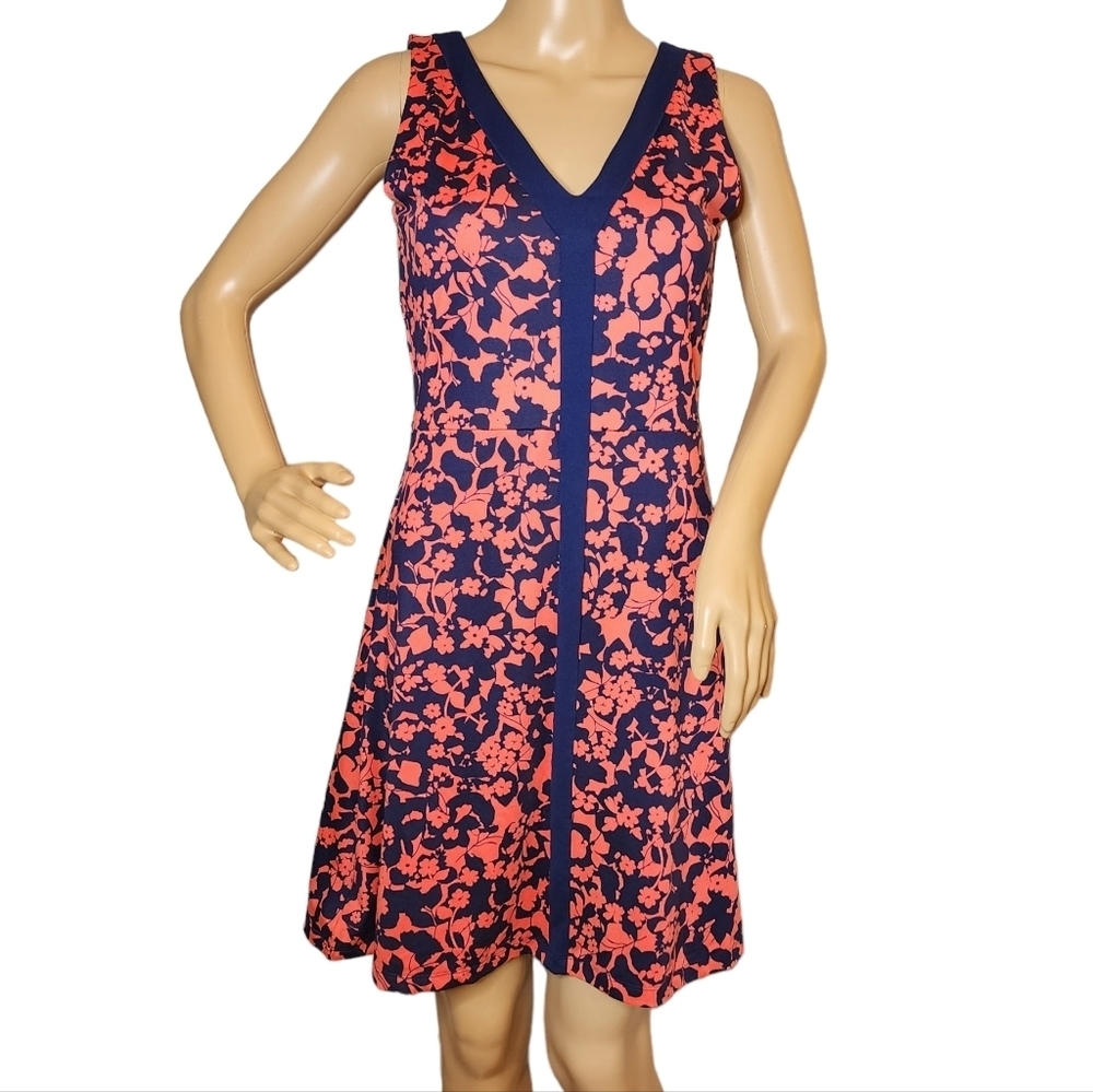 Title Nine Active Coral Blue Floral stretch sleeveles dress. Size small. Pocket.